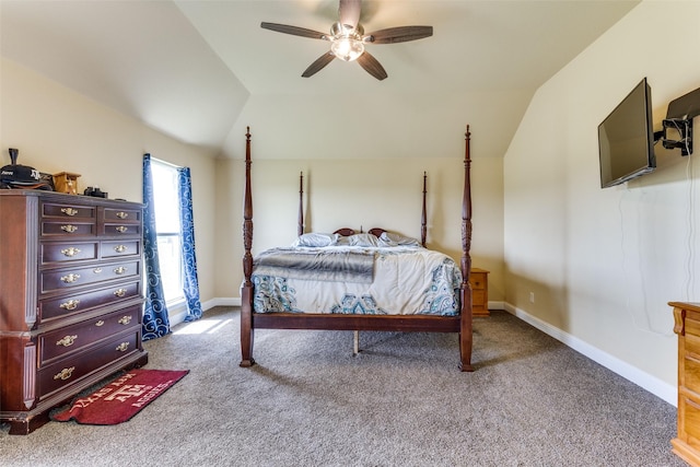 bedroom featuring vaulted ceiling, carpet flooring, and ceiling fan