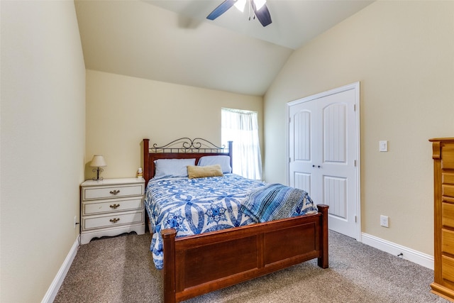 carpeted bedroom featuring vaulted ceiling, a closet, and ceiling fan