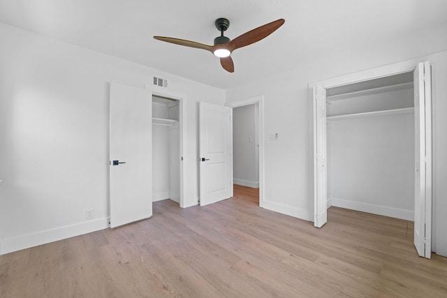 unfurnished bedroom with ceiling fan and light hardwood / wood-style flooring