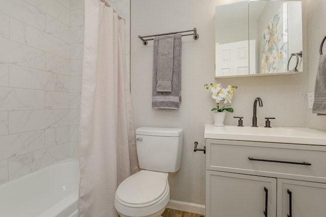 full bathroom featuring shower / bath combination with curtain, toilet, and vanity