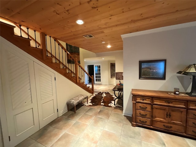 entrance foyer with visible vents, stairway, wooden ceiling, light tile patterned floors, and recessed lighting