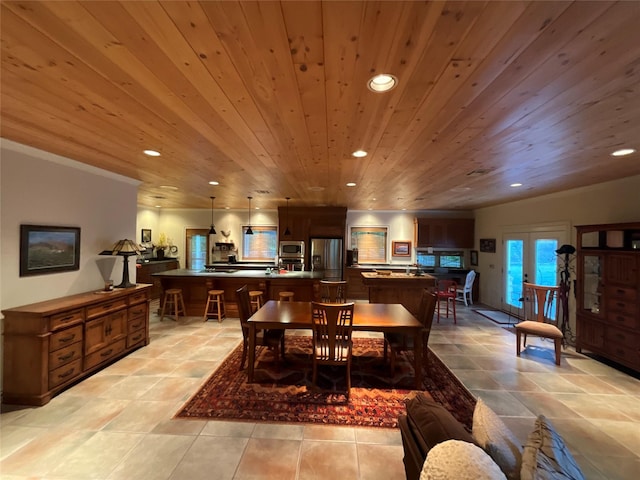 dining area with wood ceiling, recessed lighting, and light tile patterned flooring