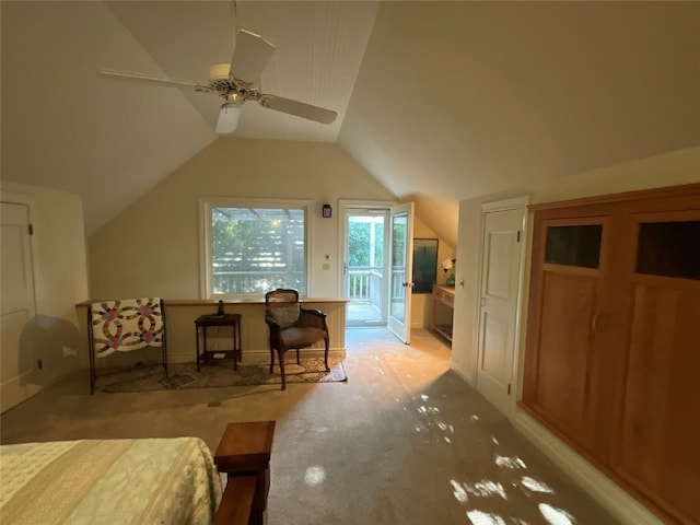 bedroom featuring access to outside, ceiling fan, vaulted ceiling, and light carpet
