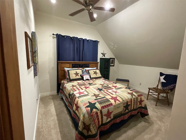 bedroom featuring ceiling fan, lofted ceiling, and carpet flooring