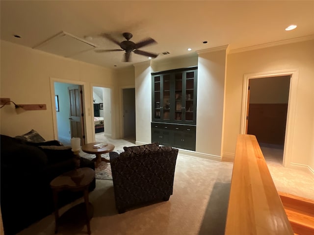 carpeted living room featuring ceiling fan