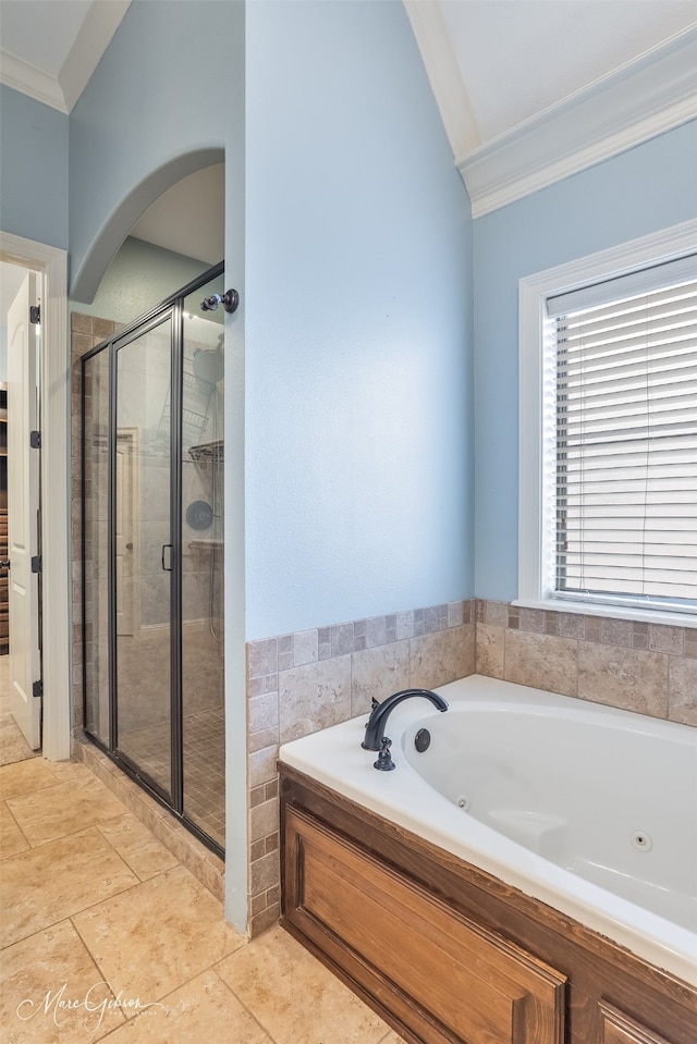 bathroom featuring ornamental molding, separate shower and tub, and tile patterned flooring