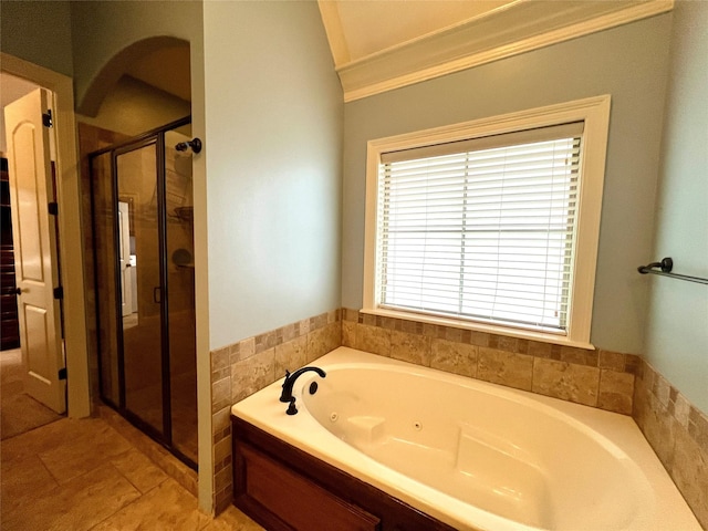 bathroom with ornamental molding, tile patterned floors, and plus walk in shower