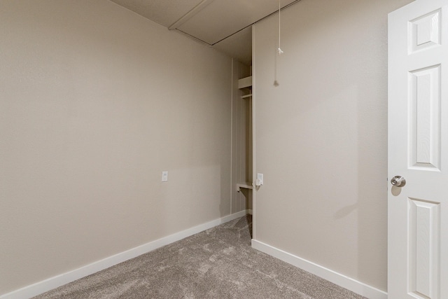 unfurnished room with light carpet