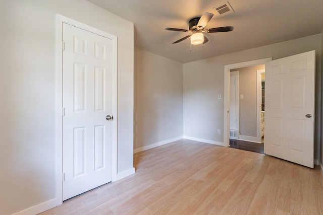 unfurnished bedroom featuring ceiling fan and light hardwood / wood-style flooring