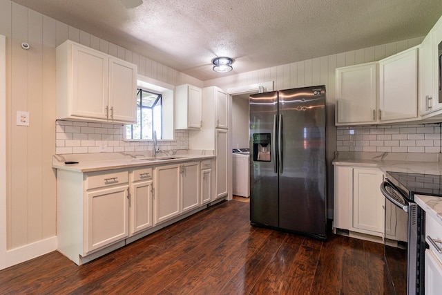 kitchen featuring dark wood-type flooring, white cabinetry, and appliances with stainless steel finishes