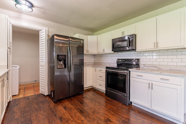 kitchen featuring dark wood-type flooring, white cabinets, and appliances with stainless steel finishes