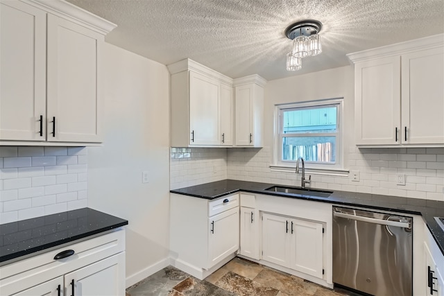 kitchen featuring sink, tasteful backsplash, a textured ceiling, dishwasher, and white cabinets