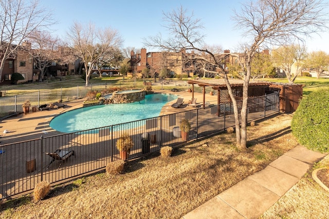 view of pool with a patio and an in ground hot tub