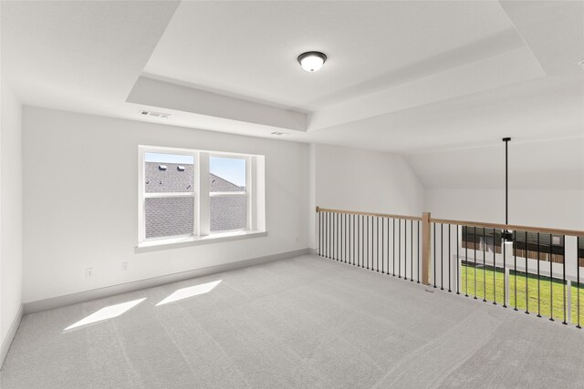 5249 Deep Creek Dr, Fort Worth, TX 76179 - empty room featuring a raised ceiling, carpet flooring, and baseboards