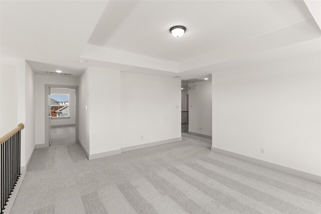 5249 Deep Creek Dr, Fort Worth, TX 76179 - spare room with a tray ceiling, light carpet, and baseboards