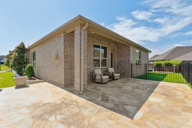 back of property featuring a patio