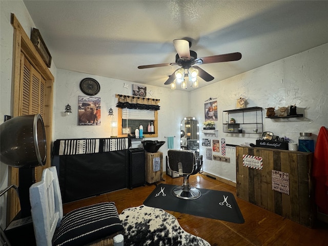 living room featuring dark hardwood / wood-style flooring and ceiling fan