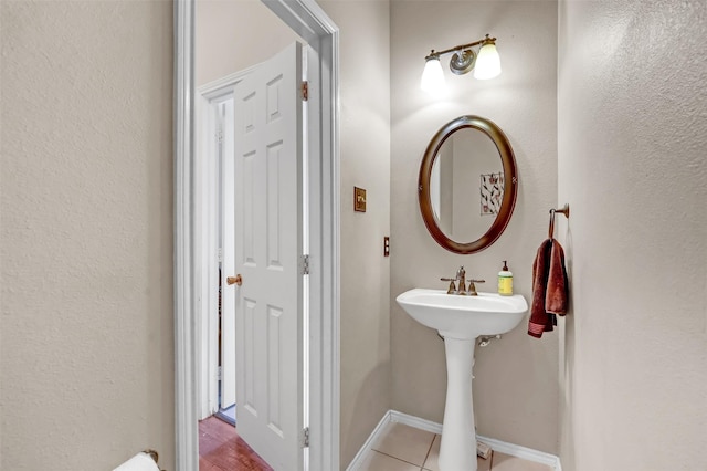 bathroom with baseboards