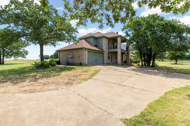 view of side of home with a balcony and cooling unit