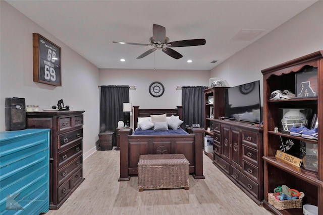 bedroom featuring ceiling fan and light wood-type flooring