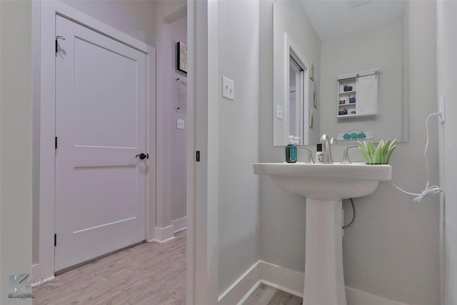 bathroom featuring hardwood / wood-style floors