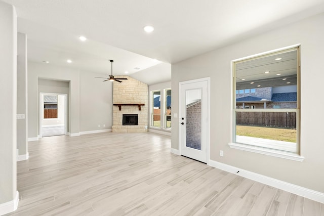 unfurnished living room with light wood-type flooring and plenty of natural light