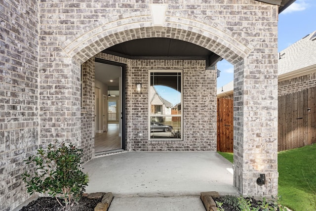 property entrance with a patio area