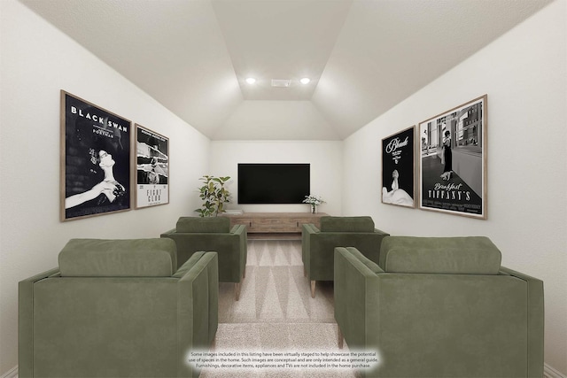 carpeted cinema room featuring lofted ceiling