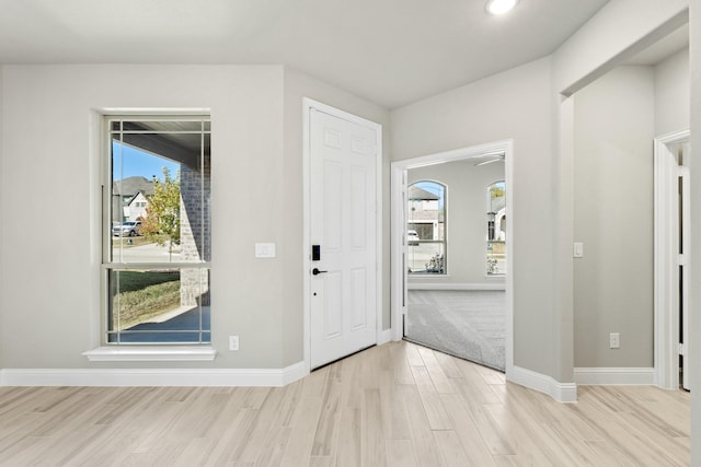 entryway with light wood-type flooring