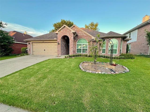 ranch-style house with a garage and a front lawn