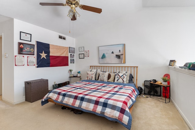 carpeted bedroom featuring ceiling fan and lofted ceiling