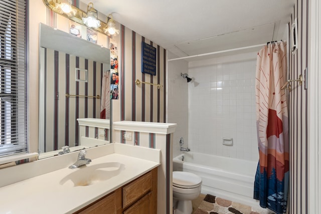 full bathroom featuring vanity, toilet, and shower / bath combo