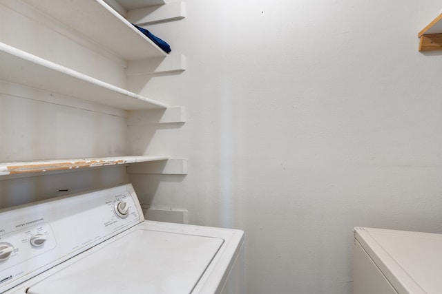 laundry area with washer / dryer