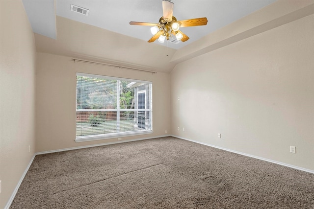 carpeted empty room with lofted ceiling and ceiling fan