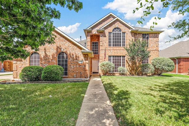 front of property featuring a front lawn