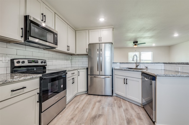 full bathroom with toilet, vanity, hardwood / wood-style flooring, and shower / bathing tub combination