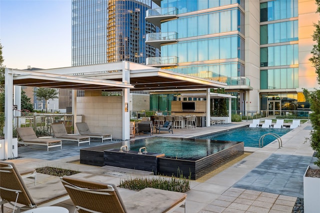 view of swimming pool featuring a patio