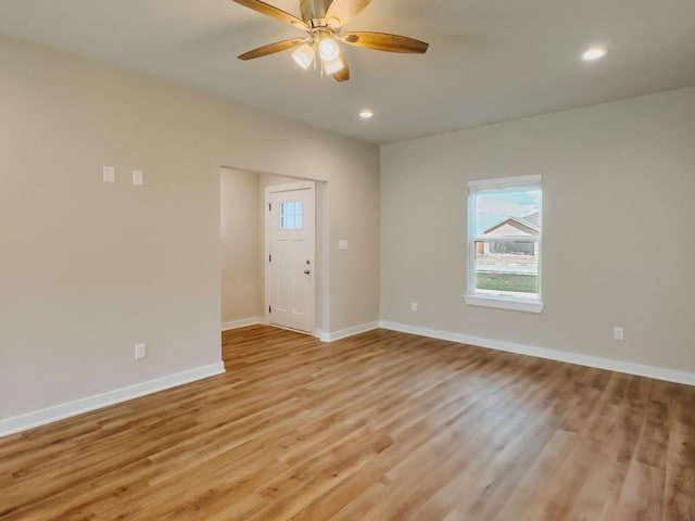 interior space featuring light hardwood / wood-style flooring and ceiling fan