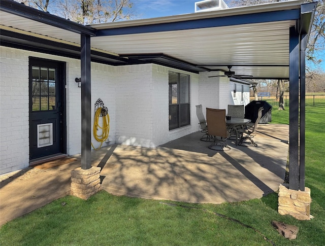 view of patio / terrace with ceiling fan and grilling area