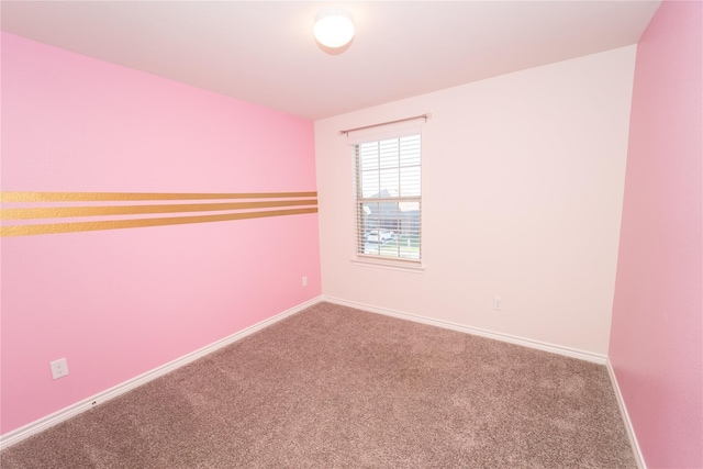 empty room featuring carpet