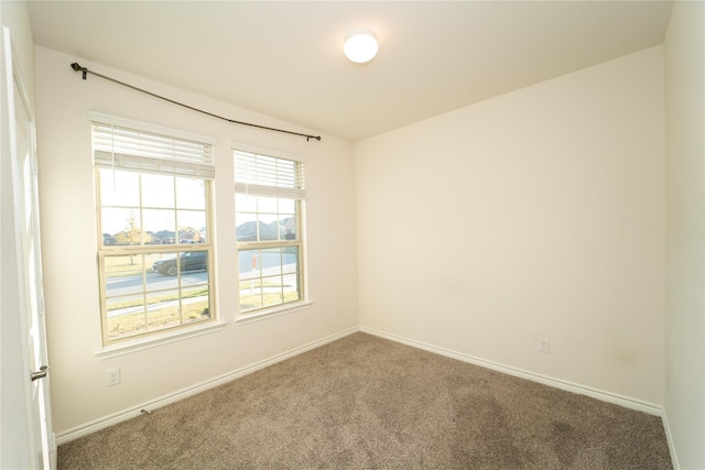 view of carpeted spare room