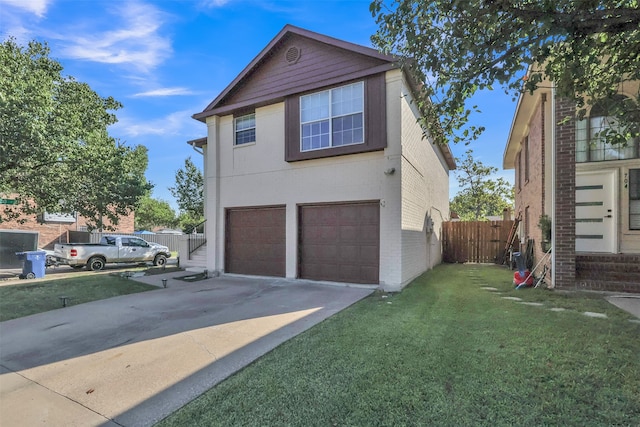 view of front facade featuring a front yard and a garage