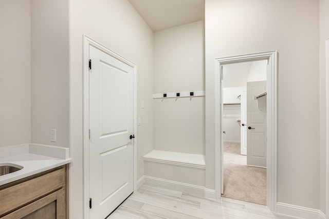 bathroom featuring vanity and wood-type flooring