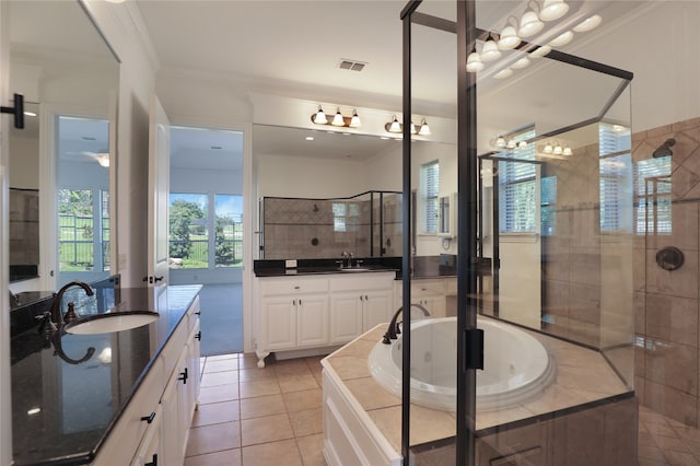 bathroom featuring tile patterned floors, plus walk in shower, and double sink vanity