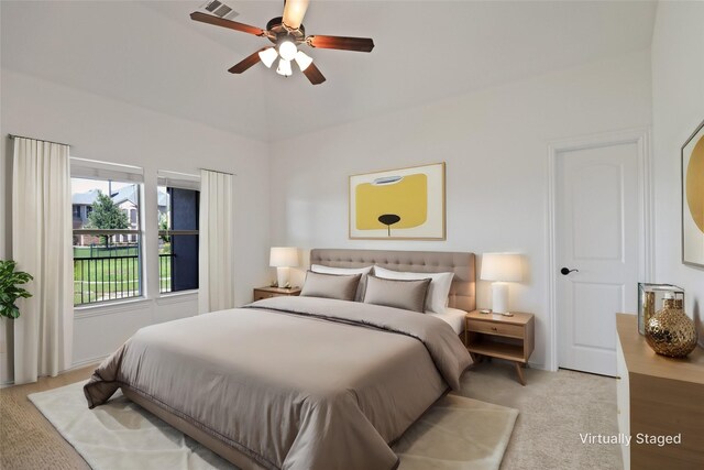 carpeted bedroom featuring ceiling fan