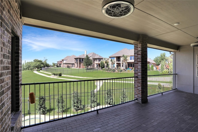 wooden deck with a yard