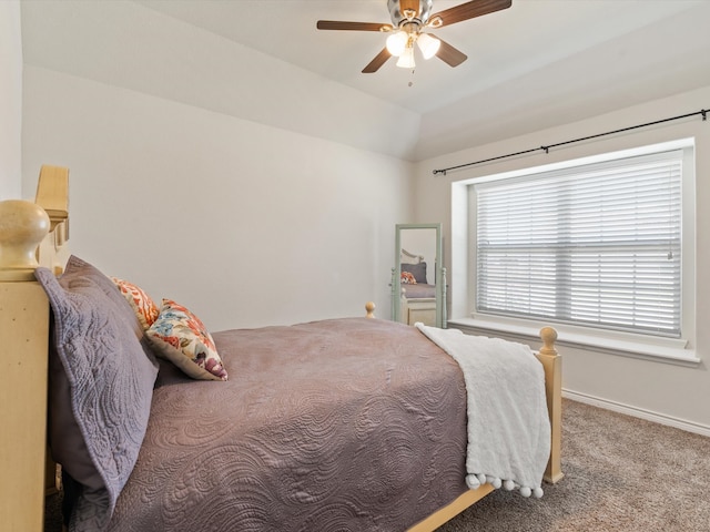 bedroom with carpet floors, ceiling fan, and lofted ceiling