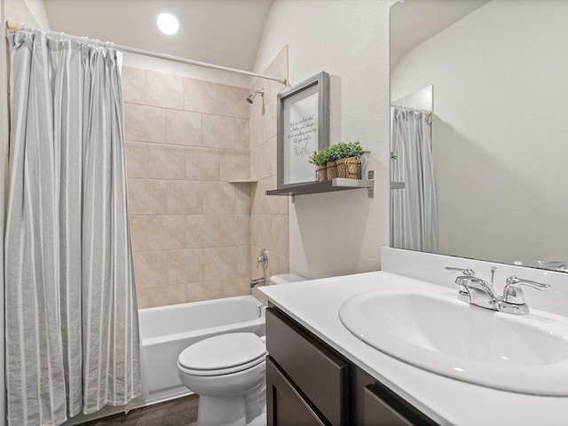 full bathroom with shower / bath combo, toilet, and vanity