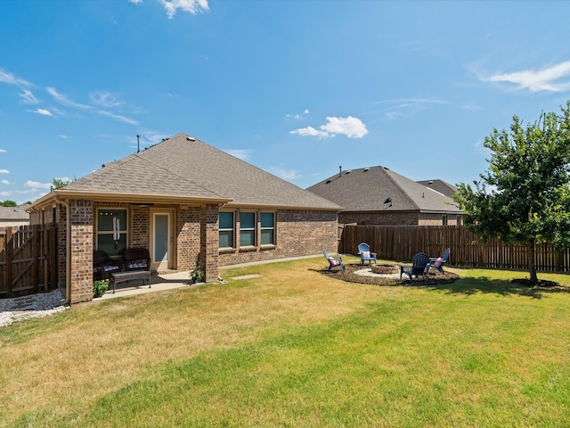 view of yard with an outdoor fire pit