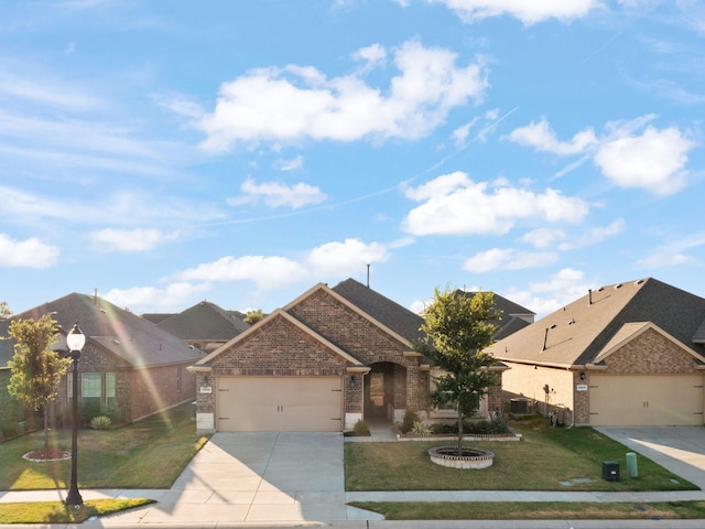 rear view of house with a patio area, a yard, and a fire pit